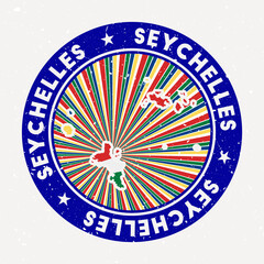 Wall Mural - Seychelles round stamp. Logo of island with flag. Vintage badge with circular text and stars, vector illustration.