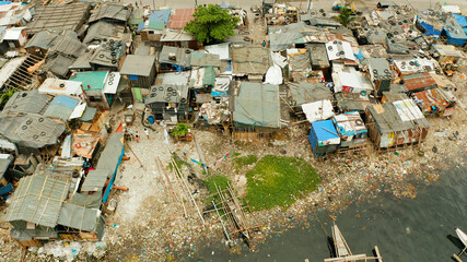 Poster - Slums in Manila near the port. River polluted with plastic and garbage. Manila, Philippines.