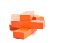 Stack Of Orange Wooden Game Blocks Isolated On White Background.