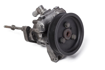 Wall Mural - hydraulic power steering pump on a white background engine parts. spare parts catalog from junkyard.