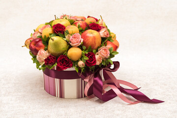 Gift floral fruit bouquet on light background