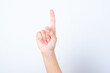 © Jihan - hand isolated on white background pointing up with finger number one.