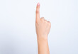 © Jihan - woman's hand pointing up with finger number one or showing something upwards.