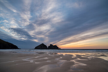 Wall Mural - absolutely stunning landscape images of holywell bay beach in cornwall uk during golden hojur sunset