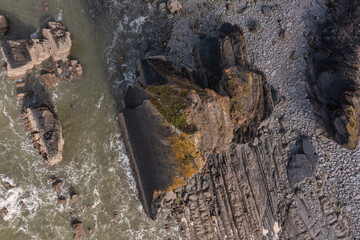 Wall Mural - stunning aerial drone flying landscape image of blackchurch rock on devonian geological formation