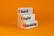 © Dzmitry - SEM search engine marketing symbol. Wooden blocks with words 'SEM search engine marketing' on beautiful orange background, copy space. Business, SEM search engine marketing concept.