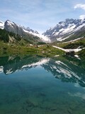 Fototapeta Krajobraz - alpine lake in the mountains Switzerland Lötschental Schweiz Suisse lac alpin 