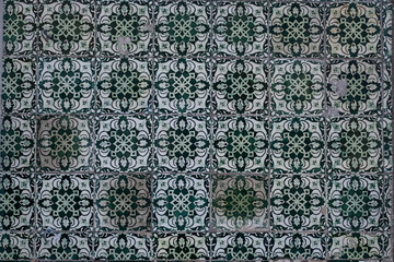 Naklejka na meble Traditional old tiles wall on the street painted tin-glazed, azulejos ceramic tilework. Porto, Portugal.