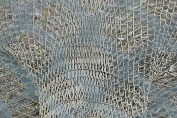 net background (with out of focus chainlink fencing pattern overlay)