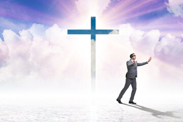 Wall Mural - Religious concept with cross and lonely man