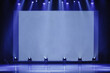 Business and Entrepreneurship concept. conference hall at business event. empty stage. Focus on the stage. blue toning photo. empty stage with a screen for the proctor, waiting for the start of the