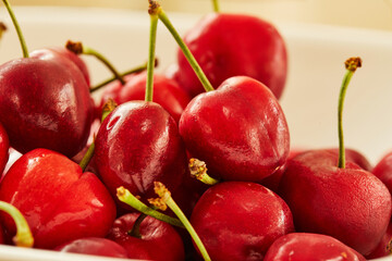 Canvas Print - Fresh cherries in white plate, ready to eat