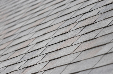 Poster - roof shingle background and texture. dark asphalt tiles on the roof.