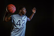© Nomad_Soul - Aggressive basketball player poses with ball