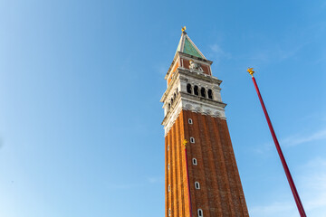 Wall Mural - Low angle view of the famous Campanile (clock tower) on St Marc's Square in Venice, Italy