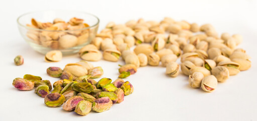 roasted pistachios on white background