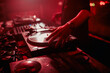 © ADDICTIVE STOCK - DJ mixing music during party in club