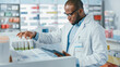 © Gorodenkoff - Pharmacy: Portrait of Professional Black Pharmacist Uses Digital Tablet Computer, Checks Inventory of Medicine, Drugs, Vitamins, Health Care Products on a Shelf. Pharmacist in Drugstore Store
