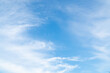 © pornpun - Summer Blue Sky and white cloud white background. Beautiful clear cloudy in sunlight spring season. vivid cyan cloudscape in nature environment. Outdoor horizon skyline with spring sunshine.