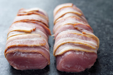 Poster - close up of bacon  wrapped pork tenderloin raw uncooked