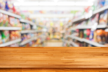 Sticker - wood table on blurred bokeh light supermarket background