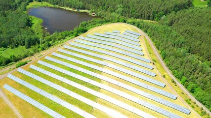 Wall Mural - Aerial view to solar power plant in recultivated  landscape after mining. Dump from old underground mine. Industry and renewable resources theme.