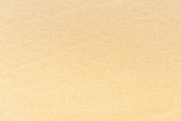 Wall Mural - Sand texture on the beach. Brown beach sand for background.