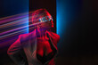 sexy cyberpunk -  Futuristic woman wearing glasses with neon light.