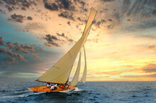 Sailboat Sailing In The Mediterranean Sea At Sunset