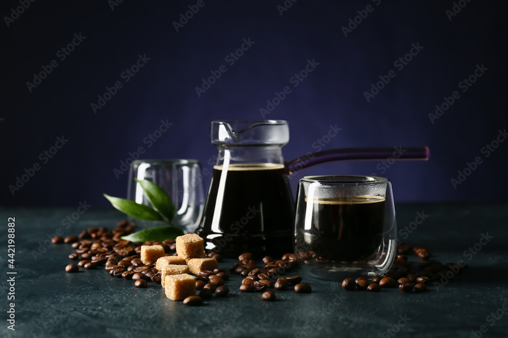Composition with aromatic turkish coffee, sugar and beans on dark color background