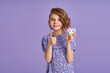 © zamuruev - Picture of little girl with a modern popit toy. Colorful and bright pop it toy simple dimple. Trendy anti stress sensory toy fidget push pop it and simple dimple in kid's hands
