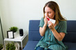 © AntonioDiaz - Caucasian woman with a runny nose
