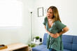 © AntonioDiaz - Woman screaming from the pain in her stomach