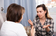 © JackF - Unhappy young female pointing to mistakes to her elderly sister during quarrel at home