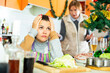 © JackF - Unhappy senior woman quarreling with daughter during cooking christmas dinner