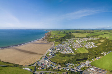 Wall Mural - Little Haven, Pembrokeshire, Wales drone aerial landscape photo with copy space green and blue