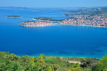 Areal view of of Mediterranean town on clear blue sea