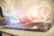 © peshkova - Multi exposure of woman hands working on computer and data theme hologram drawing. Tech concept.