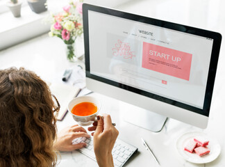 Sticker - Woman looking at startup on the computer