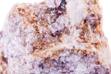 macro mineral lepidolite stone on a white background