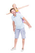 © Mediaphotos - Vertical full length side view portrait of happy handsome Caucasian man spending time with his cute daughter having fun, white background