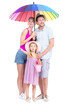 © Mediaphotos - Vertical full length studio portrait of family with one little daughter wearing summer outfits spending time on vacation, white background