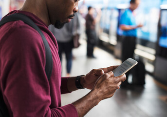 African man using mobile phone