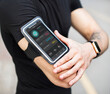 © Rawpixel.com - Man wearing a smartphone armband