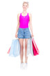 © Mediaphotos - Vertical full length studio portrait of stylish young woman wearing summer outfit carrying shopping bags, white background