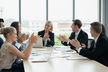 group of business people  working and disussing a project together at meeting room