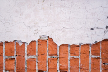 Wall Mural - White plaster and brick wall on the building