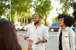 © etonastenka - Happy multiethnic young people relax together have fun talking and chatting sharing ideas. friendship, leisure, summer and people concept