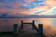 © Austockphoto - Wharf on lake early morning at sunrise