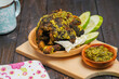 Ayam Golek or  Grilled Chicken with green chilli  Sauce Melayu Style on wooden 